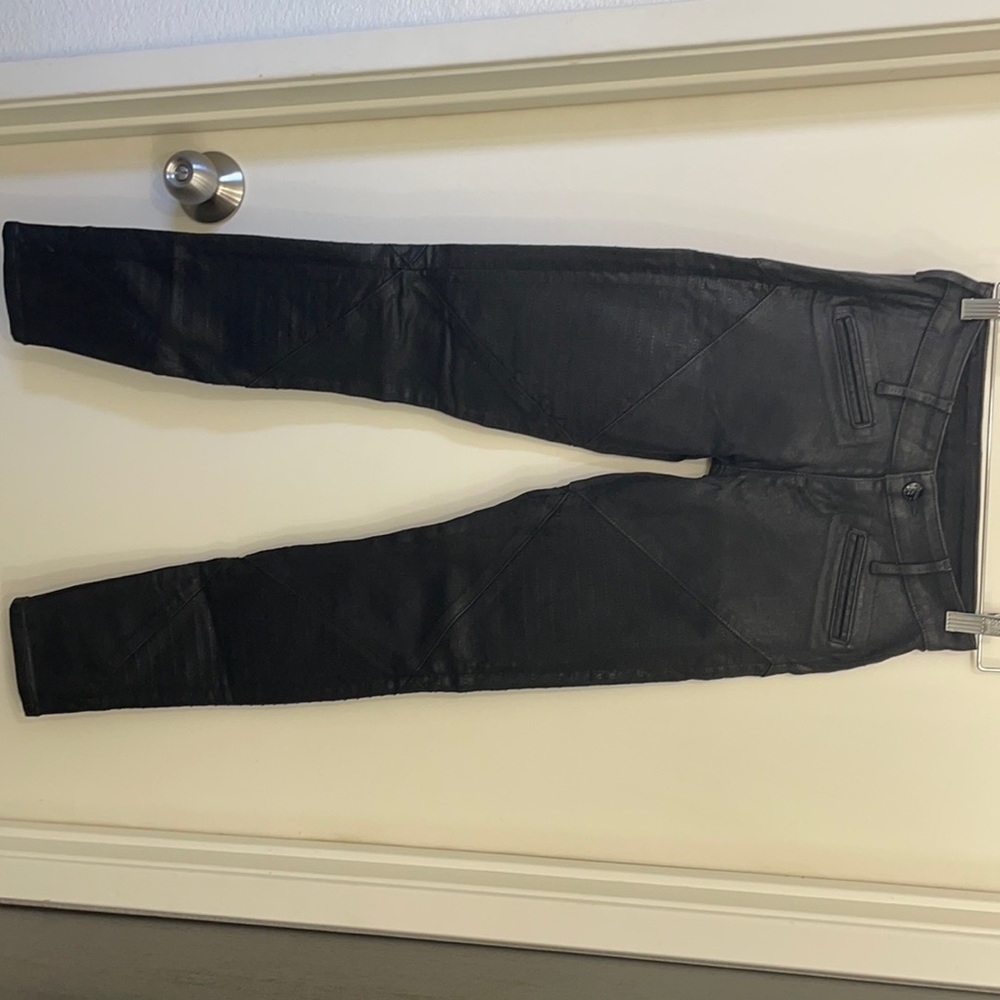 Black pocketless faux leather pants